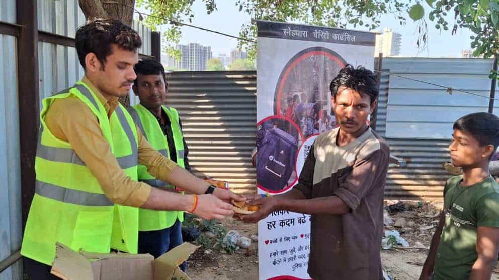Laddu and samosa Distribution at Slum Area sector 71.