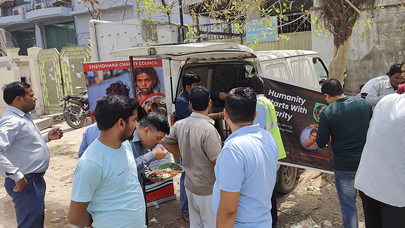 Lunch Distribution to Industrial Workers at Sector 37 Industrial Area, Gurgaon